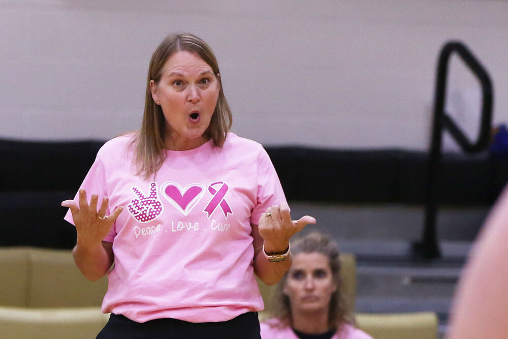 Michelle Dahlberg celebrates a point with the team during the first set